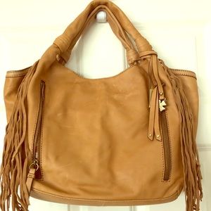 New 100% tan leather Lucky Brand fringe handbag.